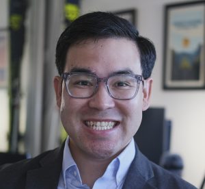 Dennis Nguyen smiling at the camera