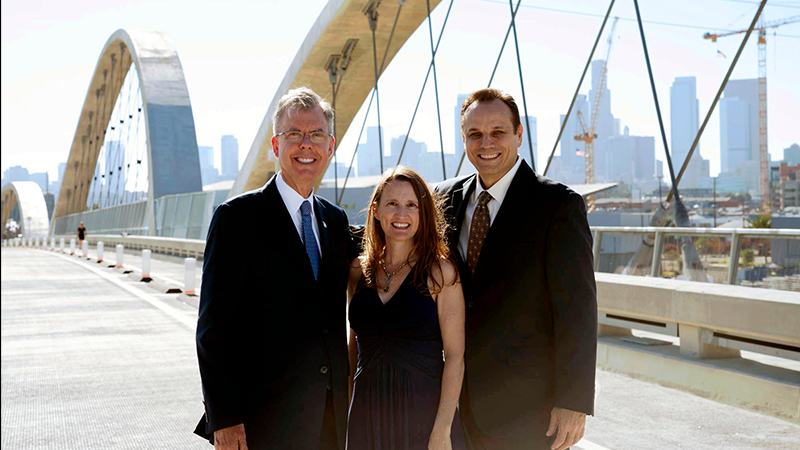 Julie Allen with colleagues in front of the new Sixth Street Bridge